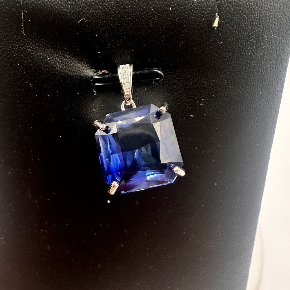8.2ct synthetic blue sapphire, accent cz diamonds, .925 stamped pendant!
